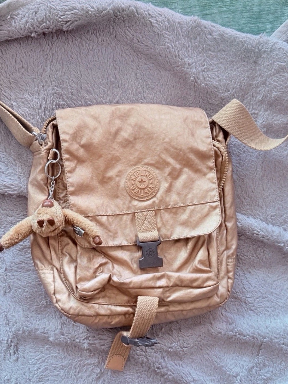 Kipling Metallic Rose Gold Crossbody Bag with Monkey Charm